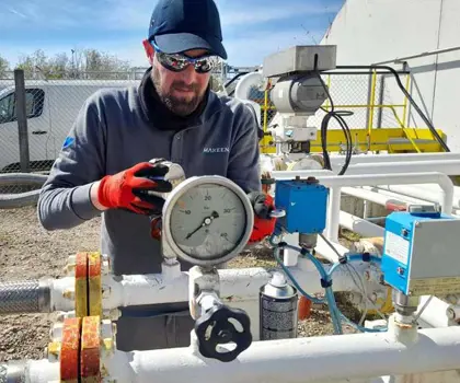 Photo of a man doing preventative maintenance